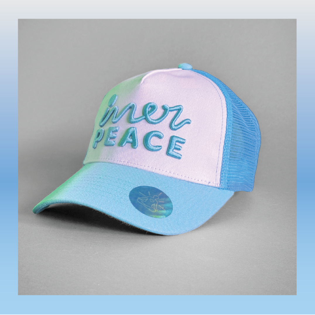 Colorful cap with 'inner Peace' text on a white background